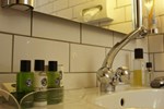 Отель Astor Hotel & Serviced Apartments Отель Astor Hotel & Serviced Apartments
