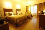 Отель Orchid - An Ecotel Hotel Отель Orchid - An Ecotel Hotel