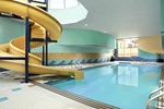 Отель Sheraton Suites Calgary Eau Claire Отель Sheraton Suites Calgary Eau Claire