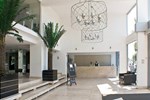 Отель Belaire Suites Hotel Отель Belaire Suites Hotel