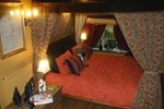Гостевой дом Wizards Thatch Luxury Suites Гостевой дом Wizards Thatch Luxury Suites