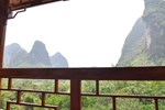 Отель Yangshuo Phoenix Pagoda Fonglou Retreat Отель Yangshuo Phoenix Pagoda Fonglou Retreat