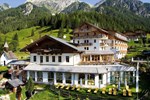 Отель Almwellnesshotel Tuffbad Отель Almwellnesshotel Tuffbad