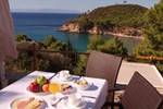 Отель Alonissos Beach Bungalows And Suites Hotel Отель Alonissos Beach Bungalows And Suites Hotel