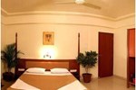 Отель Saffron Suites Отель Saffron Suites