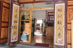 Отель Dali Four Season Flower Inn Отель Dali Four Season Flower Inn