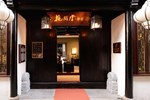 Отель Blossom Hill Inn Zhouzhuang Seasonland Отель Blossom Hill Inn Zhouzhuang Seasonland
