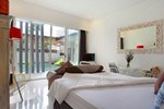 Отель The Maha Seminyak Отель The Maha Seminyak