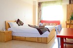 Апартаменты Dalian Mingrui Shiyuan Apartment Апартаменты Dalian Mingrui Shiyuan Apartment