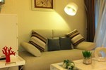 Апартаменты Shengang Apartment Dongmen Branch Апартаменты Shengang Apartment Dongmen Branch
