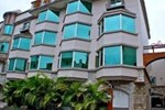 Отель Debonair Motel Отель Debonair Motel