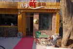 Отель Zhangjiajie The Wind Hotel Отель Zhangjiajie The Wind Hotel