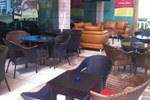 Отель Signature Suites (Al Zahra Towers) Отель Signature Suites (Al Zahra Towers)