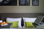 Апартаменты Park & Suites Le Bourget Blanc Mesnil Апартаменты Park & Suites Le Bourget Blanc Mesnil