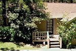 Отель Sleepy Forest Cottages Отель Sleepy Forest Cottages