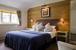 Отель New Flying Horse Inn Отель New Flying Horse Inn