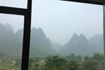 Отель Yangshuo Ecofarm Lodge Отель Yangshuo Ecofarm Lodge