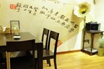 Апартаменты Fenghuang Poshan Inn Апартаменты Fenghuang Poshan Inn