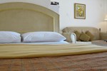 Отель Club Bali Suites at Kota Bunga Отель Club Bali Suites at Kota Bunga