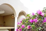 Отель Roommates Suites Отель Roommates Suites