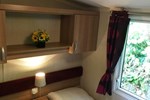 Апартаменты Holiday home a Hill Side Caravan Апартаменты Holiday home a Hill Side Caravan