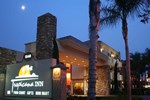 Отель Tropicana Inn & Suites Отель Tropicana Inn & Suites