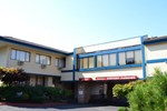 Отель Sandstone Inn & Airport Parking Отель Sandstone Inn & Airport Parking