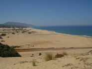 Песчаный пляж Piscinas