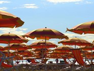 Пляжные зонтики в Линьяно