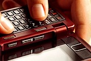 Сориентироваться в городе туристам помогут мобильники. // Istockphoto