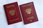 У граждан России может появиться шанс на второй загранпаспорт // Юрий Плохотниченко