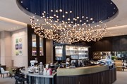 Интерьер бутика Lavazza выдержан в "кофейных" тонах. // lavazza.it